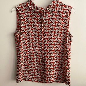 Sleeveless red floral print Tory Burch silk blouse. Size 6